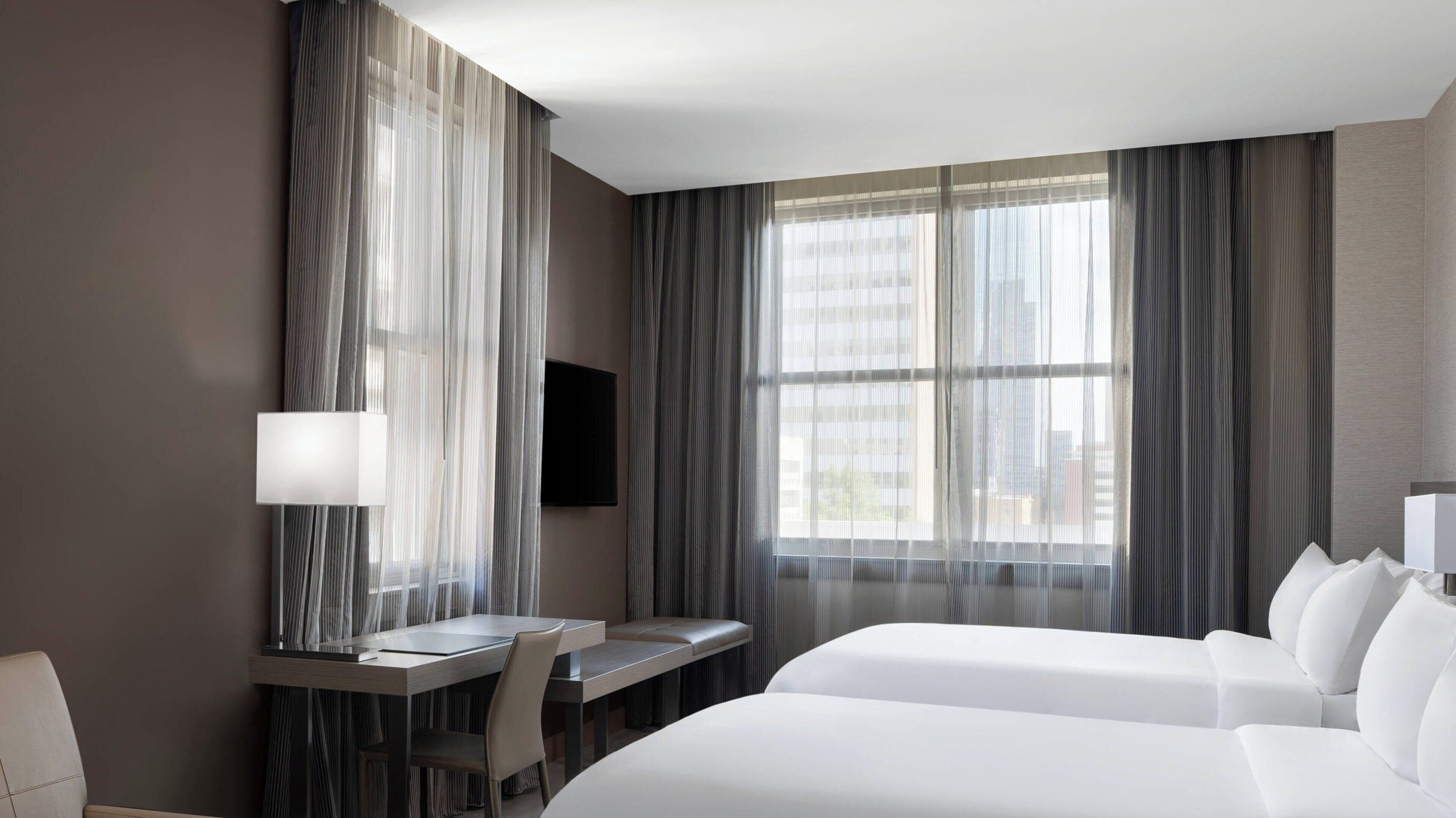 Premium bedding, down duvets, in-room safe, desk