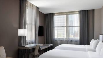 Premium bedding, down duvets, in-room safe, desk
