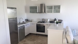Villa, 3 Bedrooms | Private kitchen | Full-sized fridge, oven, stovetop, dishwasher