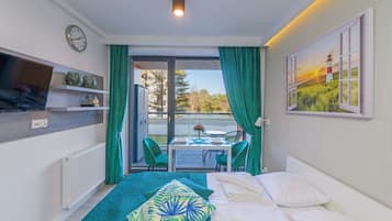 Apartamento (2/B006) | Área de estar | TV de tela plana