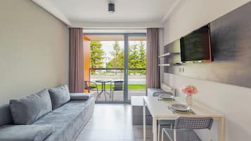 Apartment (B005) | Wohnbereich | Flachbildfernseher