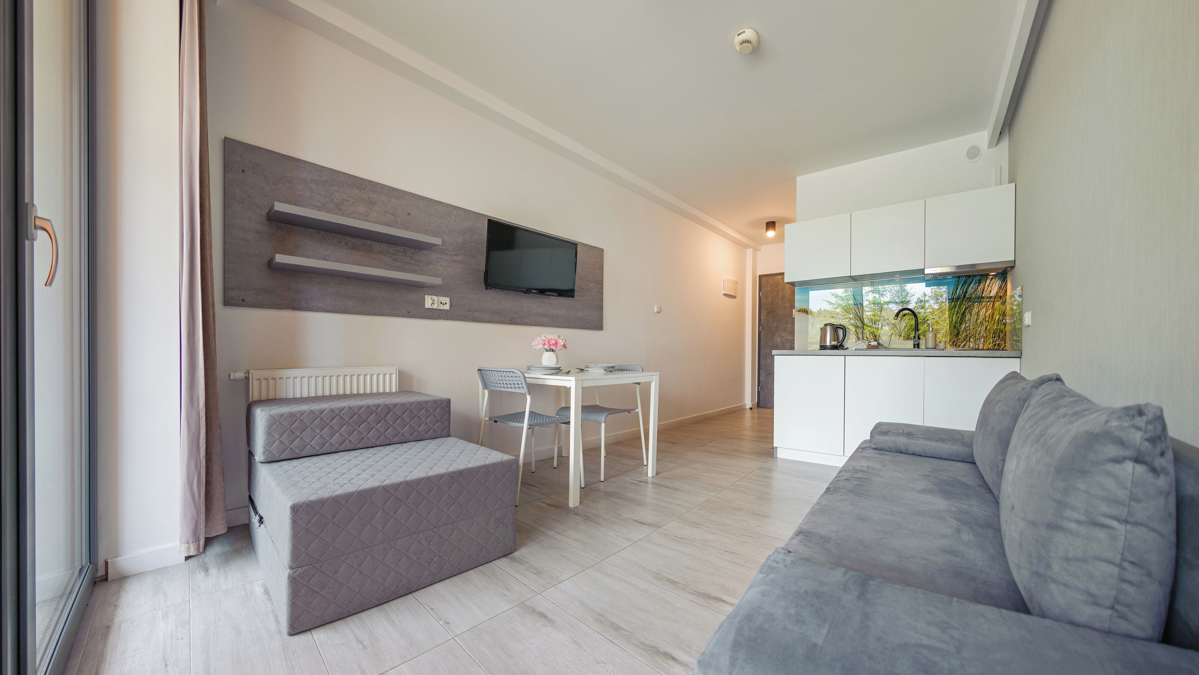 Apartment (B005) | Living area | Flat-screen TV