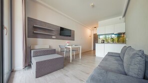 Apartment (B005) | Living area | Flat-screen TV