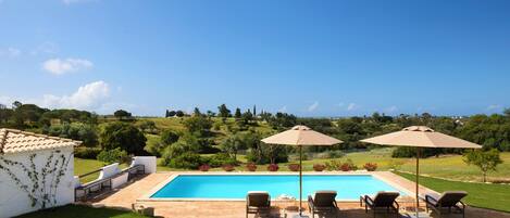 Outdoor pool, pool umbrellas, pool loungers