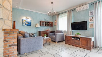 Apartamento (17) | Área de estar | TV de tela plana