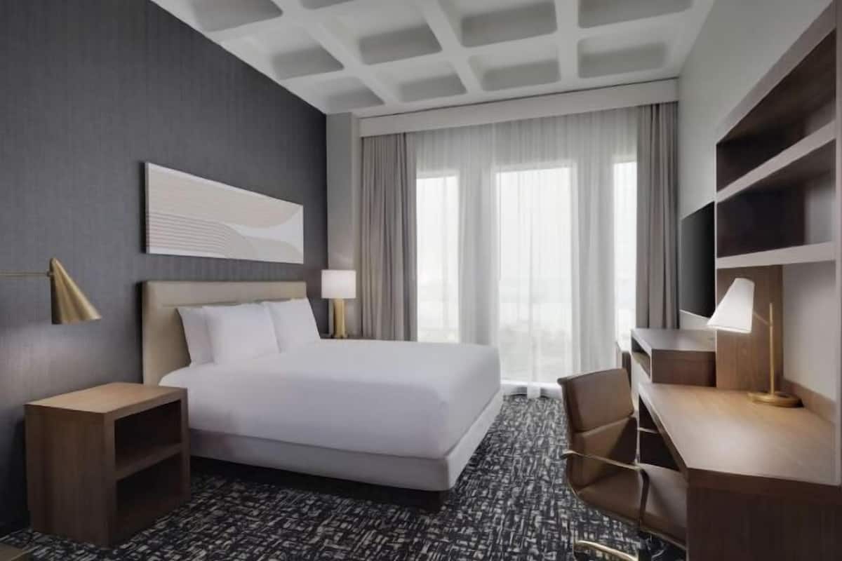 Premium bedding, pillowtop beds, in-room safe, blackout drapes