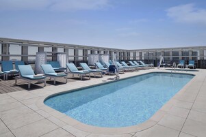 Outdoor pool, open 6:00 AM to 10:00 PM, free cabanas, sun loungers