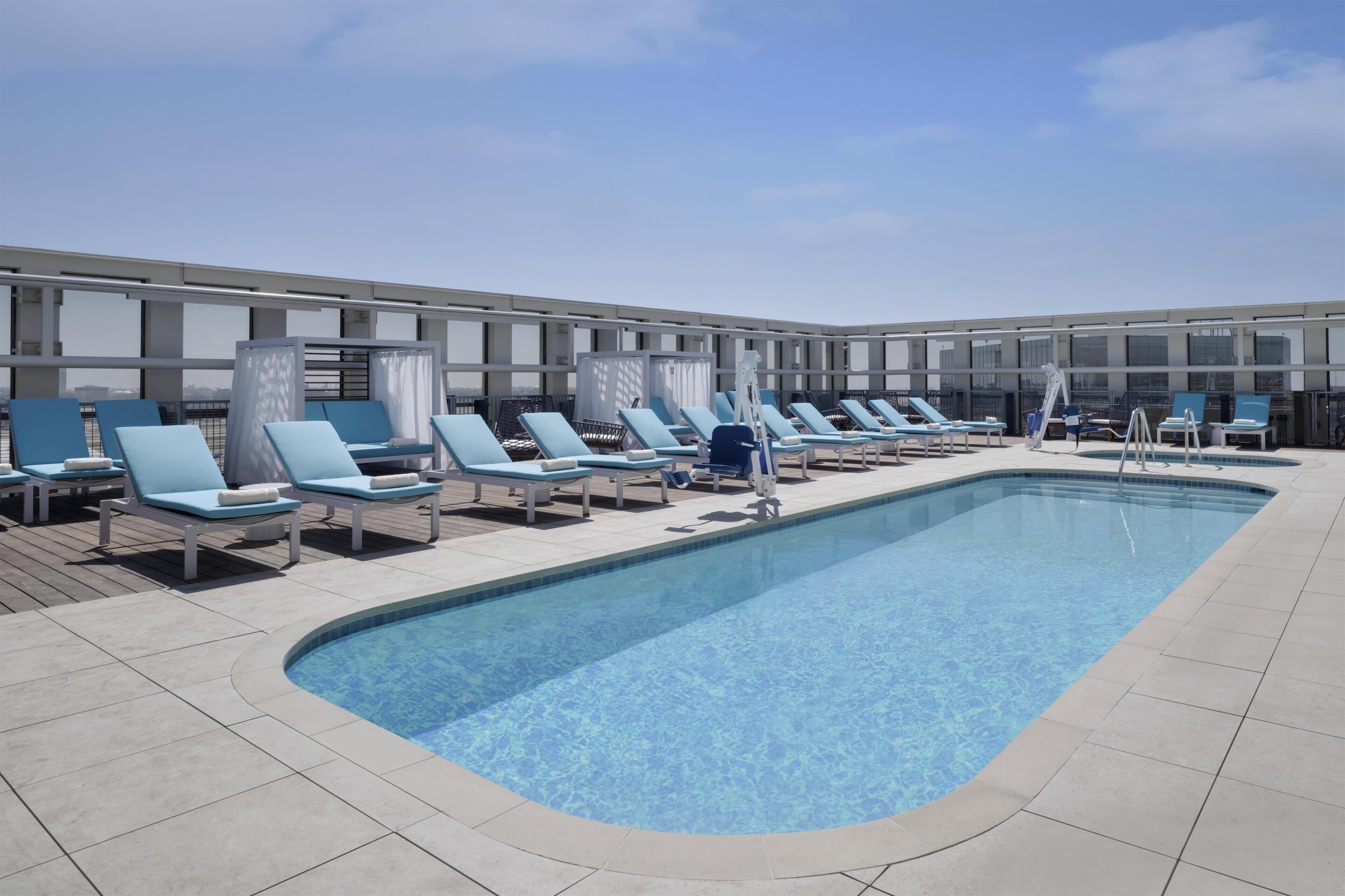 Outdoor pool, open 6:00 AM to 10:00 PM, free pool cabanas, pool loungers