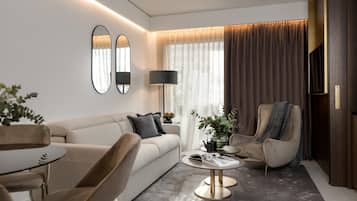 Suite presidencial, bañera de hidromasaje, vistas a la ciudad | Zona de estar