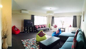 Deluxe House, 6 Bedrooms | Living area | 50-inch flat-screen TV with digital channels, LCD TV, video-game console - Hillside Heaven Quiet & Comfortable (Rotorua)