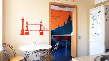 Fridge, microwave, stovetop, cookware/dishes/utensils