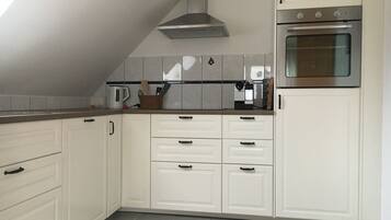 Réfrigérateur, four, plaque de cuisson, lave-vaisselle