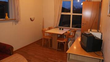 Cabin, 2 Bedrooms | Living area | Flat-screen TV