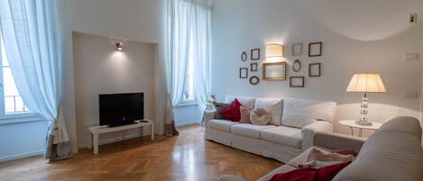 Departamento, 2 habitaciones | Área de sala de estar