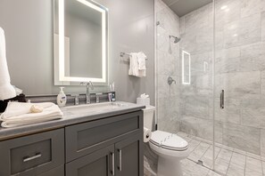 Combined shower/tub, hair dryer, towels, soap