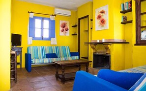 Standard Apartment, 1 Bedroom, Terrace | Living area | TV - Hacienda Guaro Viejo (Guaro)