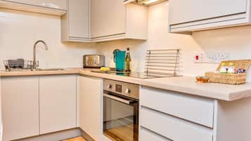 Microwave, oven, highchair, cookware/dishes/utensils