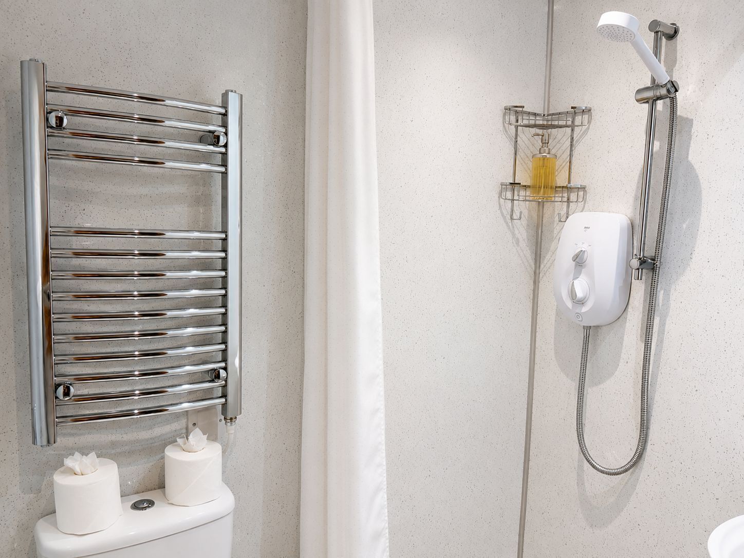 Shower, hair dryer, towels