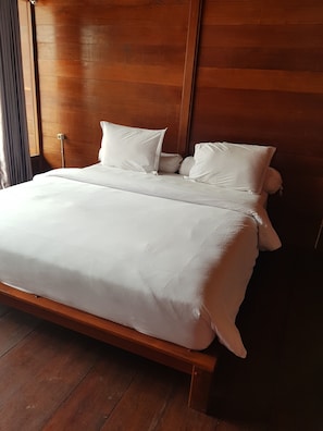 Desk, iron/ironing board, bed sheets