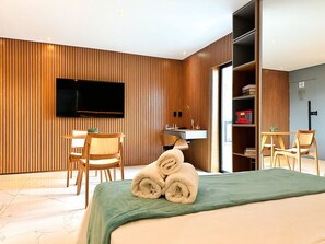 Departamento Deluxe, 1 habitación | Minibar y caja de seguridad en la habitación