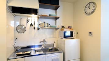 Fridge, microwave, cookware/dishes/utensils