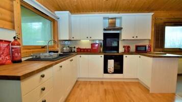 Fridge, microwave, toaster, cookware/dishes/utensils