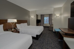 Premium bedding, individually furnished, desk, laptop workspace
