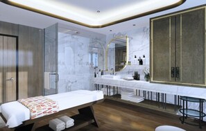 A modern hotel room with a large bed, a glass shower enclosure, a vanity with a large mirror, and a wooden floor. - Royal Malioboro Yogyakarta by Aston (Yogyakarta)