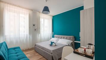 Doppia Deluxe | Minibar, una scrivania, ferro/asse da stiro, Wi-Fi gratuito