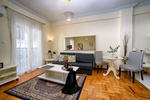 Standard Apartment | Living area | 44-inch flat-screen TV with digital channels, TV, offices - Acropolis Plaka Lovely Flat (Athens)