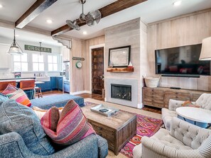 Smart TV, fireplace, DVD player, books