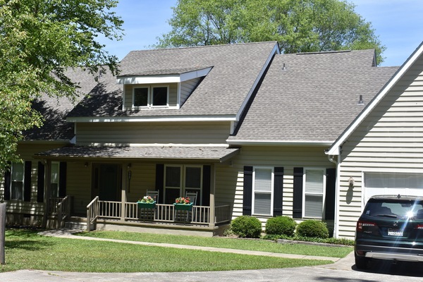 Front of house with spacious parking