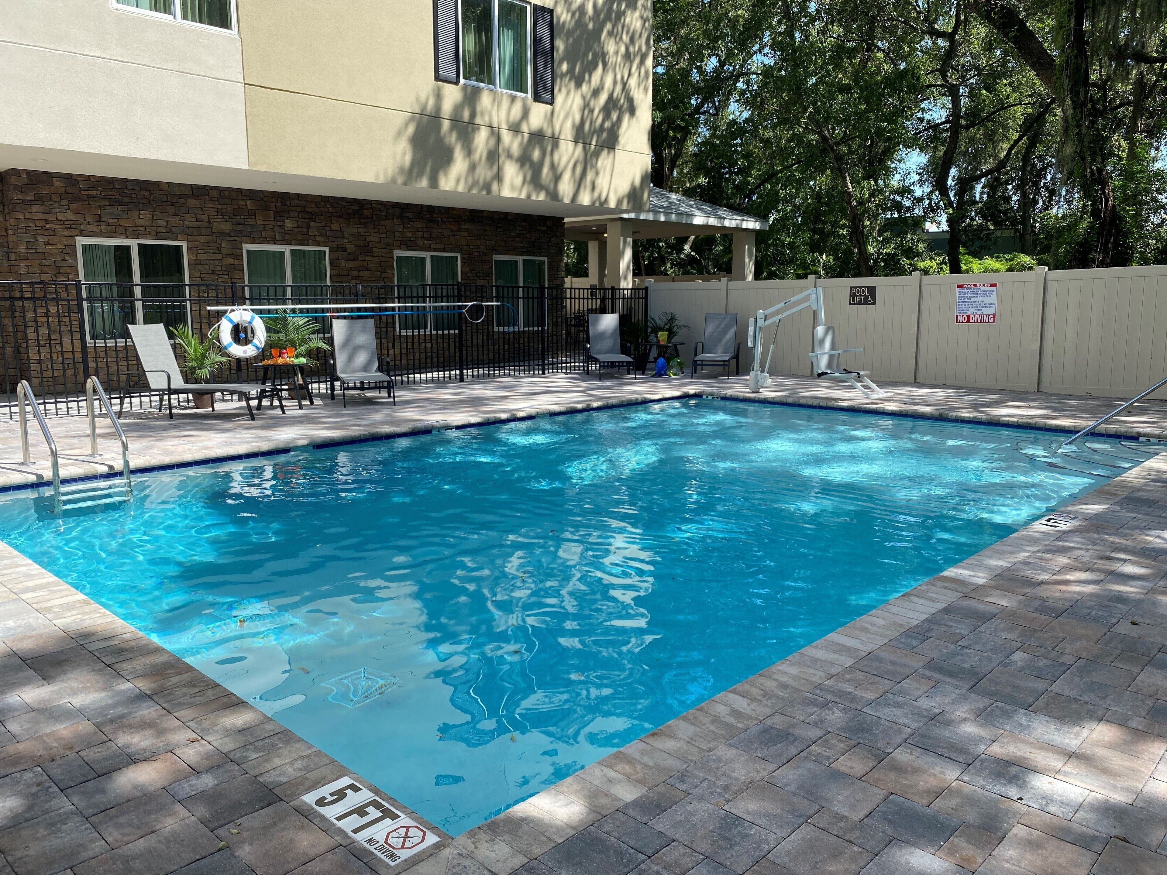 outdoor pool, pool umbrellas, pool loungers