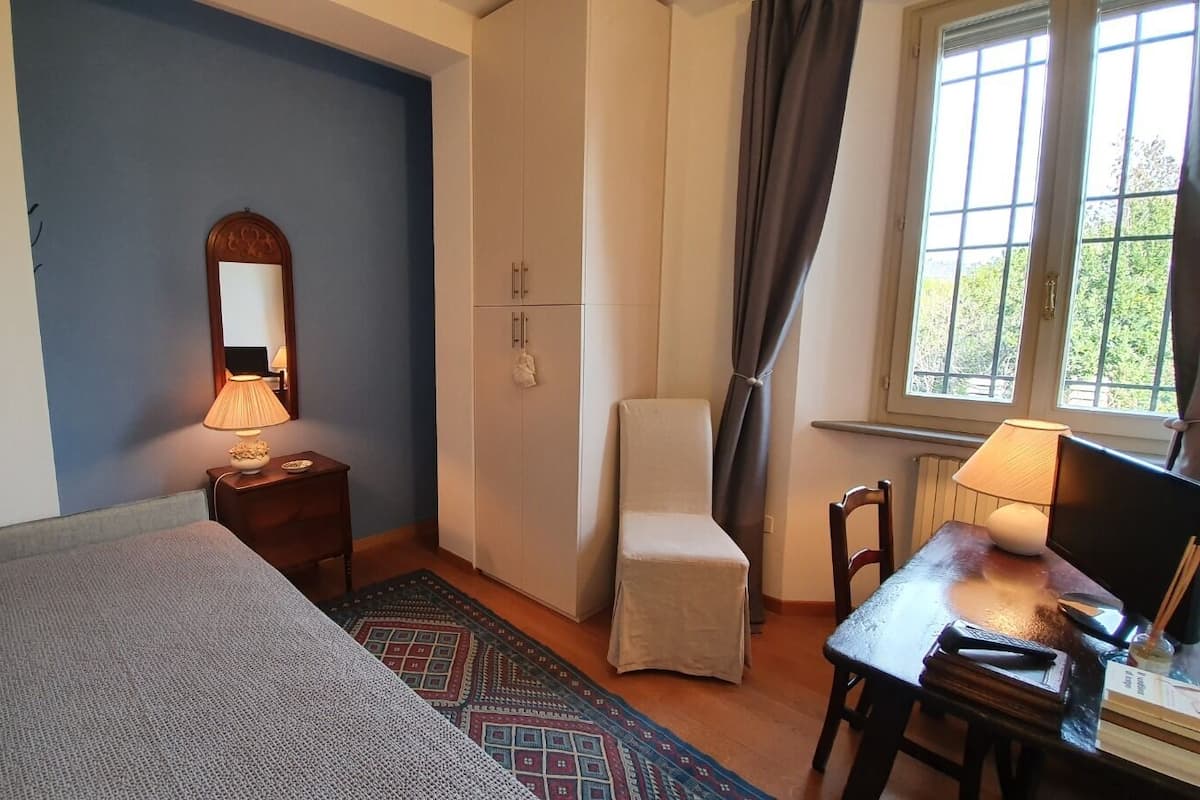 Desk, laptop workspace, free WiFi, bed sheets
