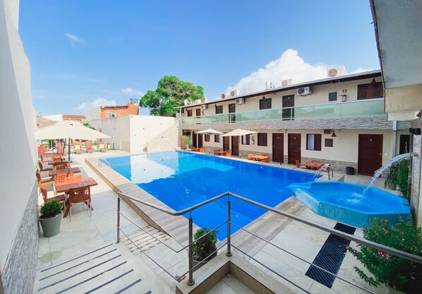 32-inch flat-screen TV with satellite channels, foosball