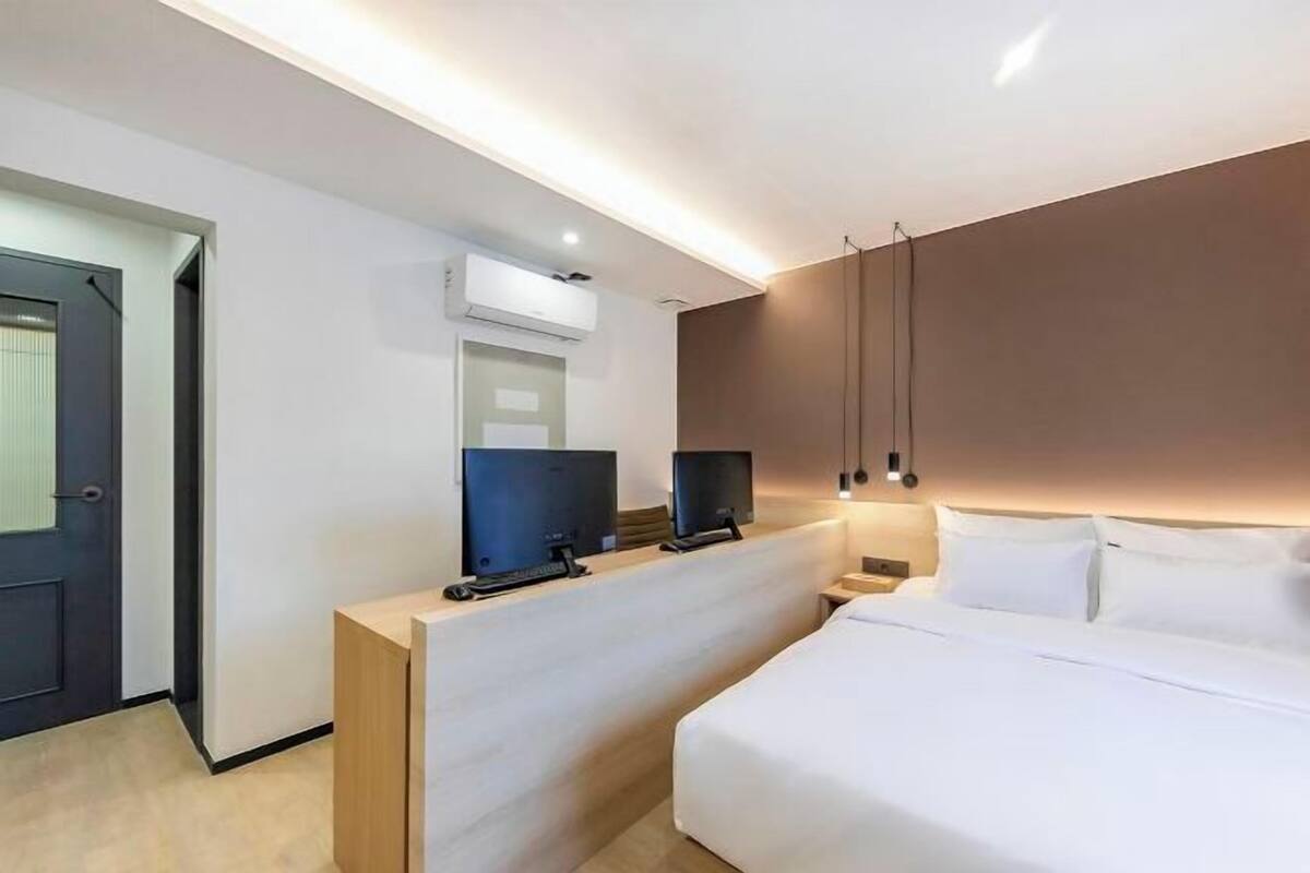 Premium bedding, down comforters, memory foam beds, desk