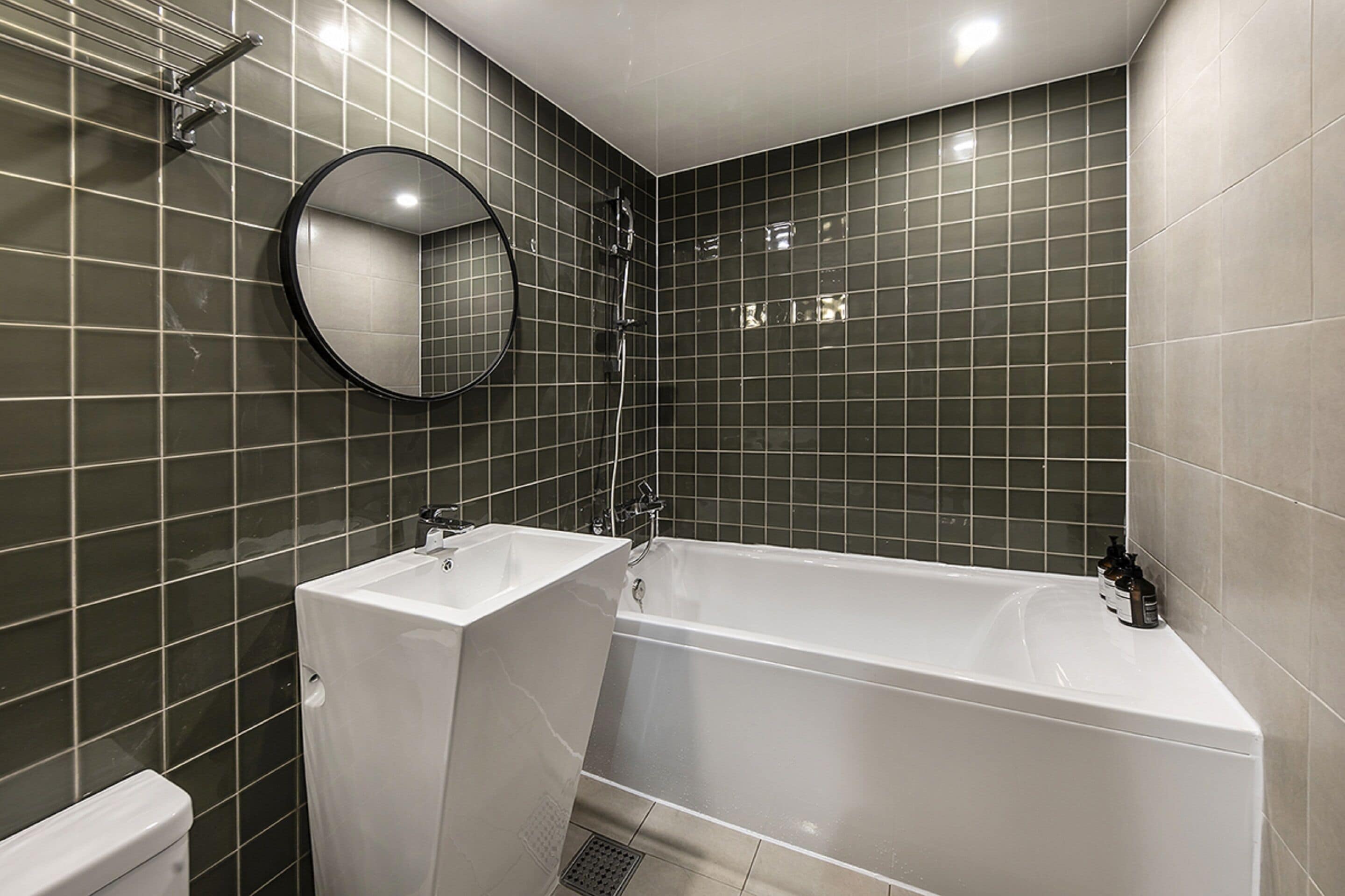 designer toiletries, hair dryer, bathrobes, slippers