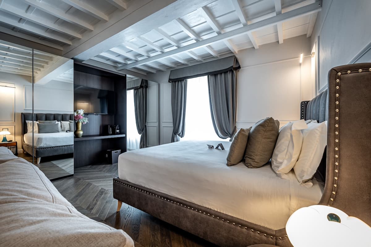 Junior Suite, River View | Frette Italian sheets, premium bedding, Select Comfort beds, minibar
