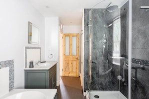 Bathtub, hair dryer, towels