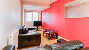 Standard Apartment, 2 Double Beds (4 Guests) | Living area | 28-inch TV with satellite channels