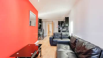 Standard Apartment, 2 Double Beds (4 Guests) | Living area | 28-inch TV with satellite channels