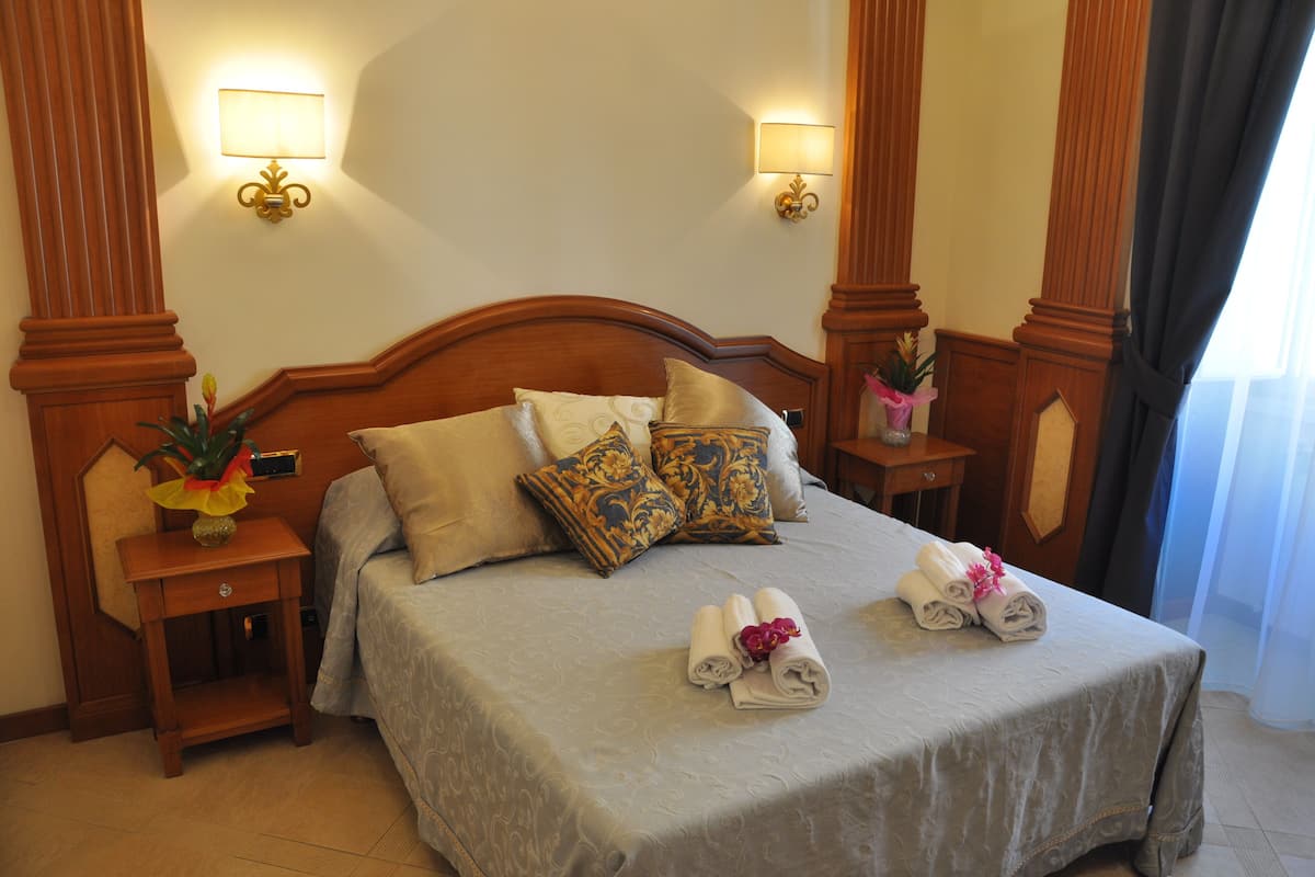 Premium bedding, down comforters, memory foam beds, in-room safe
