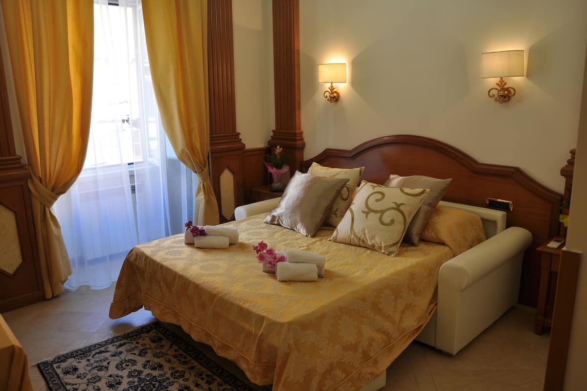 Premium bedding, down comforters, memory foam beds, in-room safe