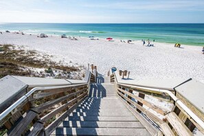 A wooden staircase leading to a beach with white sand and clear blue water. - SALE~"Ocho Cinco"~Heated Pool~Walk to Beach, Seaside~Beach Gear~Family Lux (Seagrove Beach)