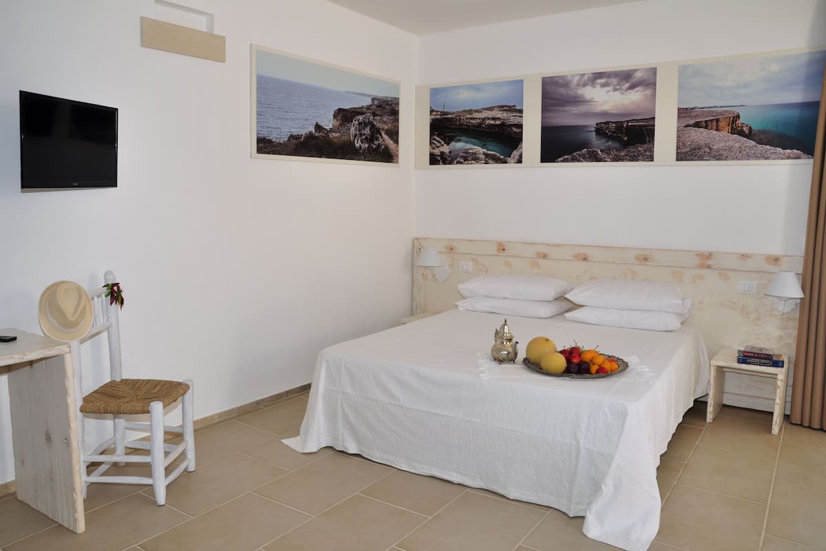Habitación cuádruple | Sábanas italianas Frette y ropa de cama de alta calidad