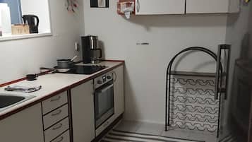 Standard Apartment, 2 Bedrooms | Private kitchen | High chair
