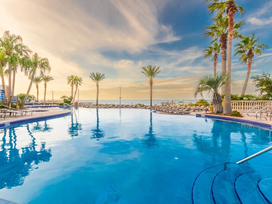 Indoor pool, 3 outdoor pools, open 9:00 AM to 10:00 PM, pool loungers
