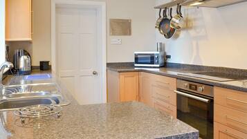 Oven, dishwasher, highchair, cookware/dishes/utensils