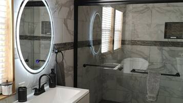 Bathtub, hair dryer, towels