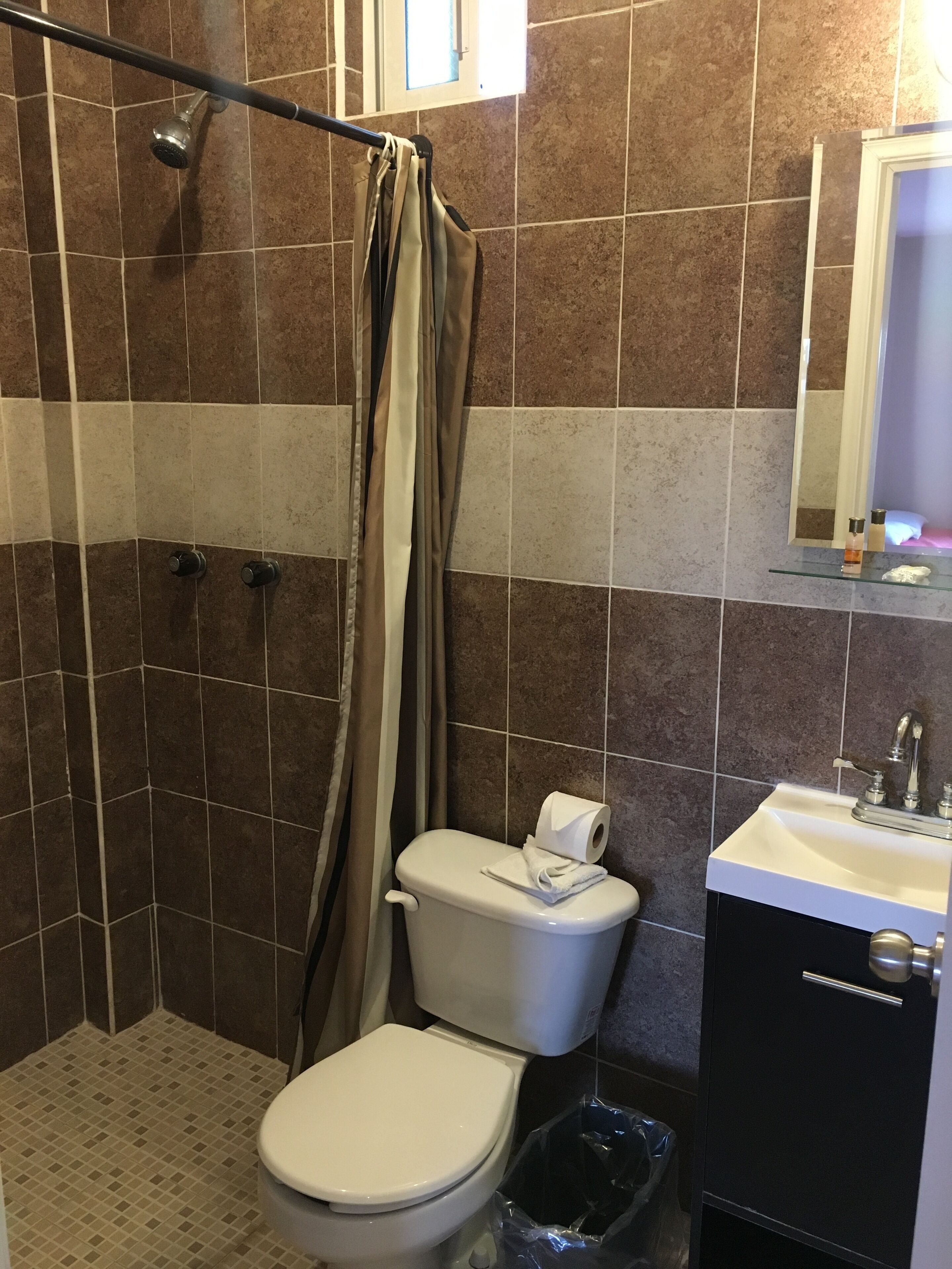 triple room (room 6) | bathroom | shower, designer toiletries, towels, soap